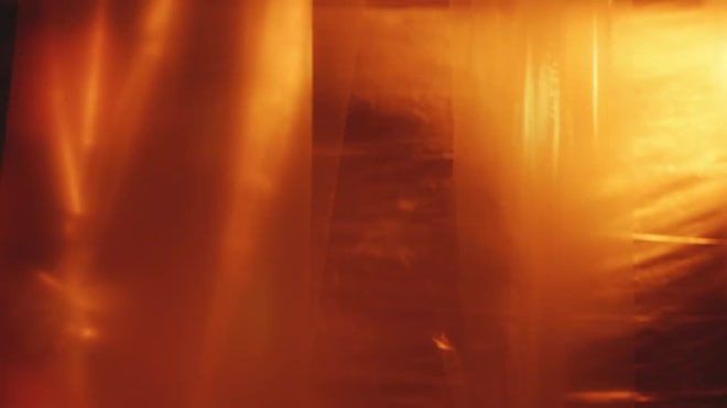 Plastic Curtains Fluttering In Dark Studio With Neon Illumination